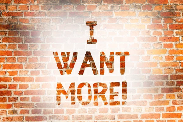 Writing note showing I Want More. Business photo showcasing Not having enough of something bigger challenges requirements Brick Wall art like Graffiti motivational call written on the wall.