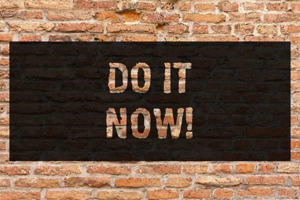 Writing note showing Do It Now. Business photo showcasing Respond Immediately Something needs to be done right away Brick Wall art like Graffiti motivational call written on the wall.