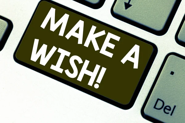 Text sign showing Make A Wish. Conceptual photo To have dreams desires about future events Be positive Keyboard key Intention to create computer message pressing keypad idea.