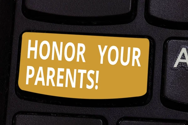 Handwriting text Honor Your Parents. Concept meaning high respect great esteem for your parents elderly Keyboard key Intention to create computer message pressing keypad idea.