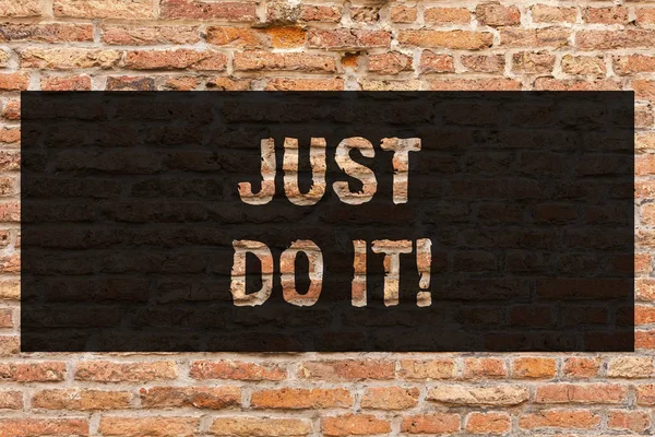 Writing note showing Just Do It. Business photo showcasing Motivation for starting doing something Have discipline Brick Wall art like Graffiti motivational call written on the wall.