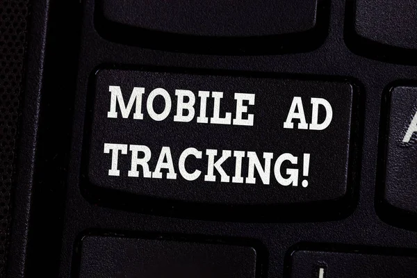 Handwriting text writing Mobile Ad Tracking. Concept meaning monitor brand perforanalysisce including advertising awareness Keyboard key Intention to create computer message pressing keypad idea.