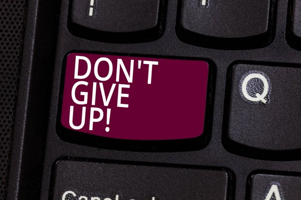 Word writing text Don T Give Up. Business concept for Keep trying until you succeed follow your dreams goals Keyboard key Intention to create computer message pressing keypad idea.
