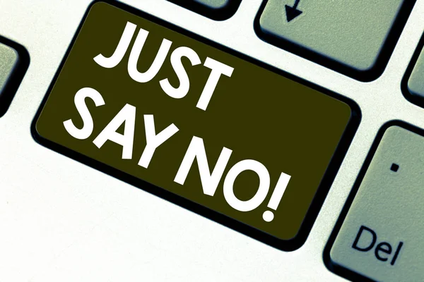 Text sign showing Just Say No. Conceptual photo Do not be afraid of giving negative answers to some things Keyboard key Intention to create computer message pressing keypad idea.