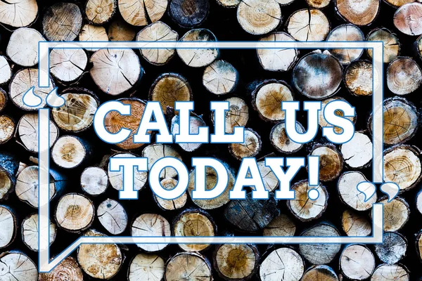 Writing note showingCall Us Today. Business photo showcasing Make a telephone calling to ask for advice or support Wooden background vintage wood wild message ideas intentions thoughts.