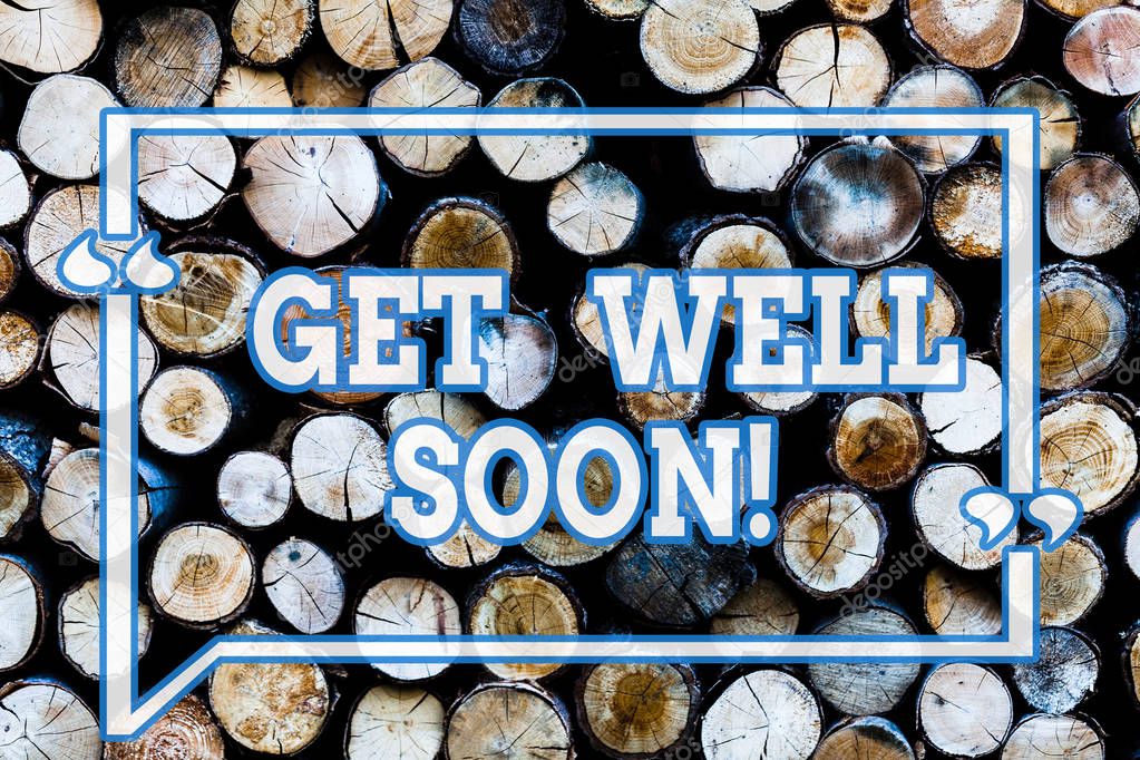Writing note showingGet Well Soon. Business photo showcasing Wishing you have better health than now Greetings good wishes Wooden background vintage wood wild message ideas intentions thoughts.