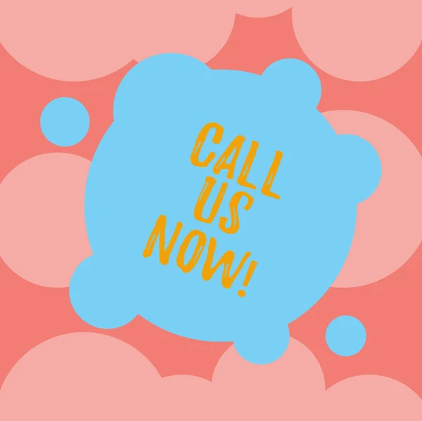 Writing note showing Call Us Now. Business photo showcasing Communicate by telephone to contact help desk support assistance Blank Deformed Color Round Shape with Small Circles Abstract photo.