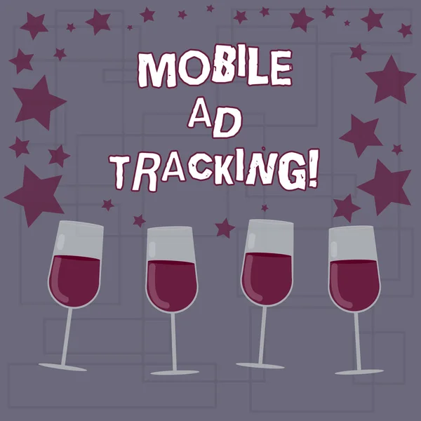 Text sign showing Mobile Ad Tracking. Conceptual photo monitor brand perforanalysisce including advertising awareness Filled Cocktail Wine Glasses with Scattered Stars as Confetti Stemware.