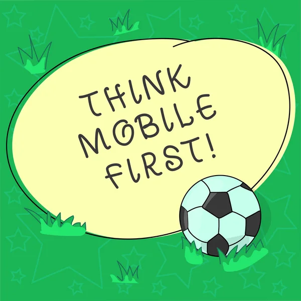 Handwriting text Think Mobile First. Concept meaning designing online experience for phones before web Soccer Ball on the Grass and Blank Outlined Round Color Shape photo.