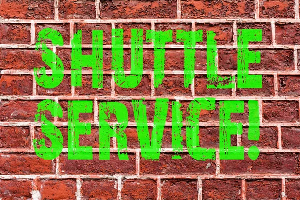 Word writing text Shuttle Service. Business concept for Transportation Offer Vacational Travel Tourism Vehicle Brick Wall art like Graffiti motivational call written on the wall.