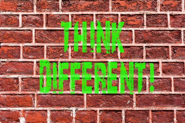 Word writing text Think Different. Business concept for Rethink Change on vision Acquire New Ideas Innovate Brick Wall art like Graffiti motivational call written on the wall.