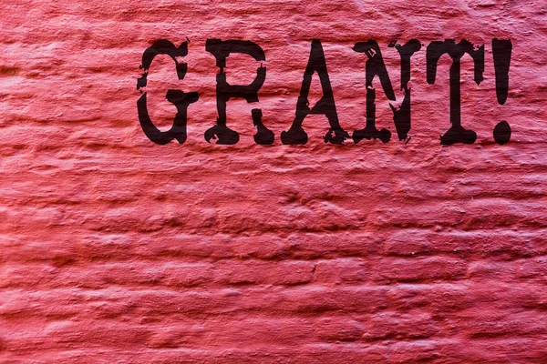 Konceptuella hand skriva visar Grant. Företag foto text pengar ges av en organisation eller regeringen för ett ändamål stipendium Brick Wall art som Graffiti motiverande samtal skriven på väggen. — Stockfoto