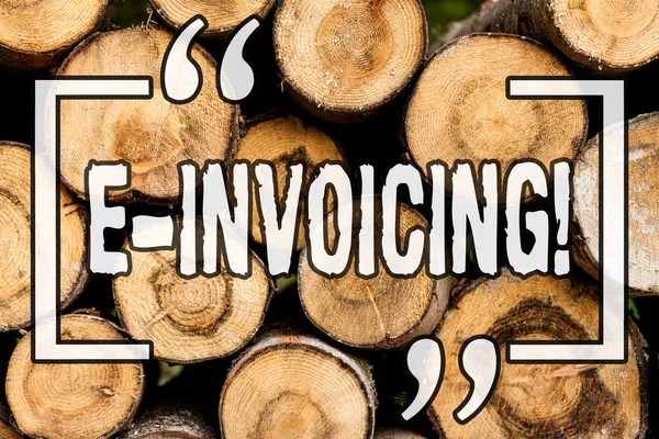 Word writing text E Invoicing. Business concept for Company encourages use of digital billing Wooden background vintage wood wild message ideas intentions thoughts.