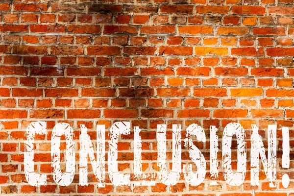 Word writing text Conclusion. Business concept for Ending a storey with inspirational quotes Brick Wall art like Graffiti motivational call written on the wall.