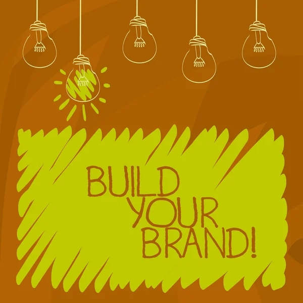 Концептуальный почерк, показывающий Build Your Brand. Демонстрация бизнес фото создать свой собственный логотип слоган Модель рекламы E маркетинг . — стоковое фото