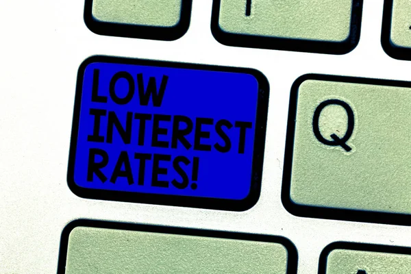 Writing note showing Low Interest Rates. Business photo showcasing meant to stimulate economic growth making it cheaper Keyboard key Intention to create computer message pressing keypad idea.