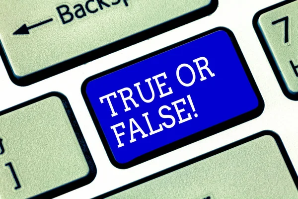 Handwriting text True Or False. Concept meaning Decide between a fact or telling a lie Doubt confusion Keyboard key Intention to create computer message pressing keypad idea.