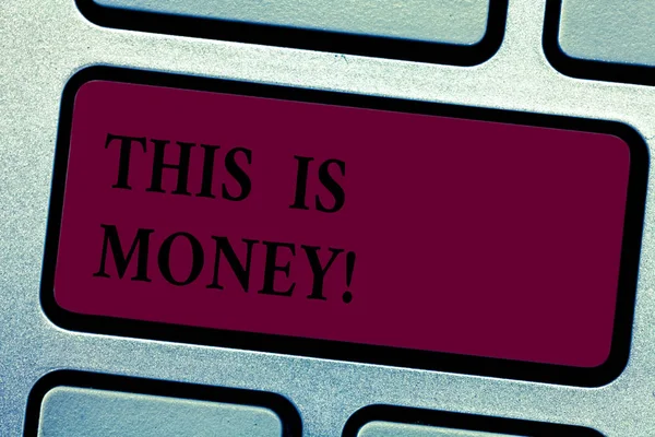 Writing note showingThis Is Money. Business photo showcasing Large revenues from work or investment Good incomes earnings Keyboard key Intention to create computer message pressing keypad idea. — Stock Photo, Image