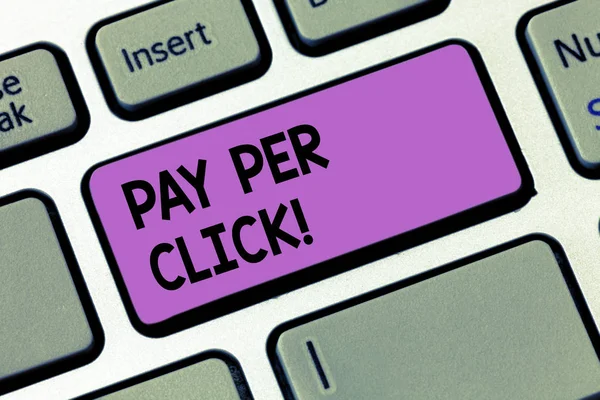 Writing note showingPay Per Click. Business photo showcasing Internet Advertising Model Search Engine marketing Strategy Keyboard key Intention to create computer message pressing keypad idea. — Stock Photo, Image