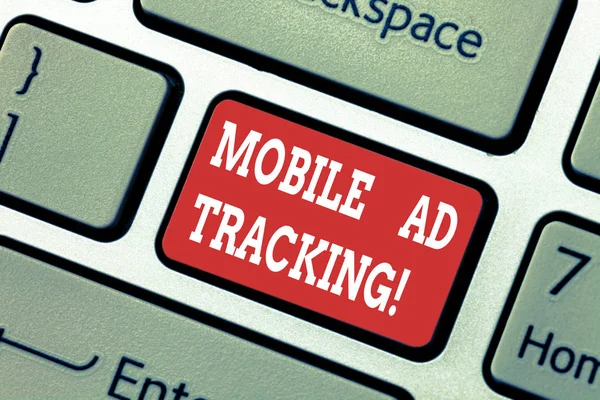 Writing note showing Mobile Ad Tracking. Business photo showcasing monitor brand perforanalysisce including advertising awareness Keyboard key Intention to create computer message pressing keypad idea