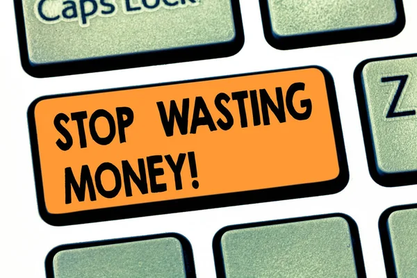 Writing note showing Stop Wasting Money. Business photo showcasing avoid dissipation waste useless or profitless activity Keyboard key Intention to create computer message pressing keypad idea.