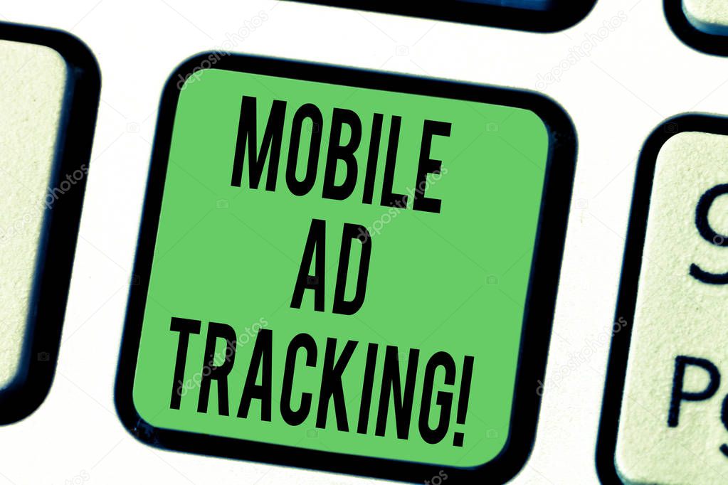 Word writing text Mobile Ad Tracking. Business concept for monitor brand perforanalysisce including advertising awareness Keyboard key Intention to create computer message pressing keypad idea.