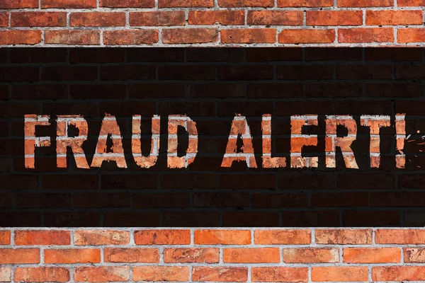 Text sign showing Fraud Alert. Conceptual photo Security Message Fraudulent activity suspected Brick Wall art like Graffiti motivational call written on the wall.