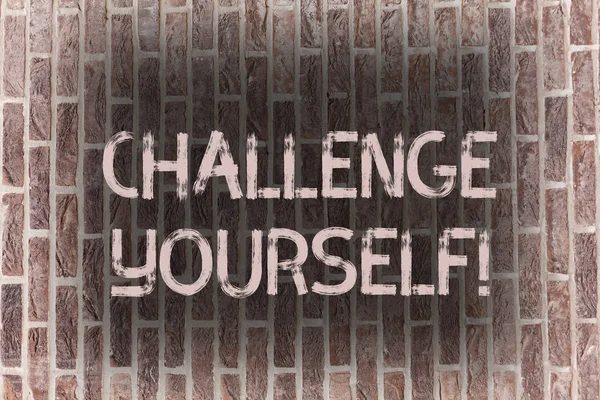 Word writing text Challenge Yourself. Business concept for Overcome Confidence Strong Encouragement Improvement Dare Brick Wall art like Graffiti motivational call written on the wall.