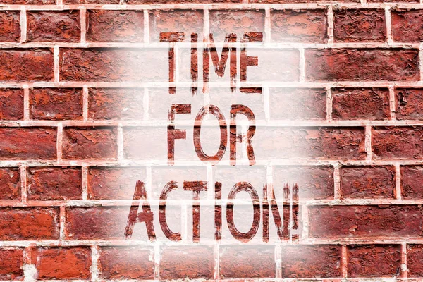 Handwriting text writing Time For Action. Concept meaning Urgency Move Encouragement Challenge Work Brick Wall art like Graffiti motivational call written on the wall.