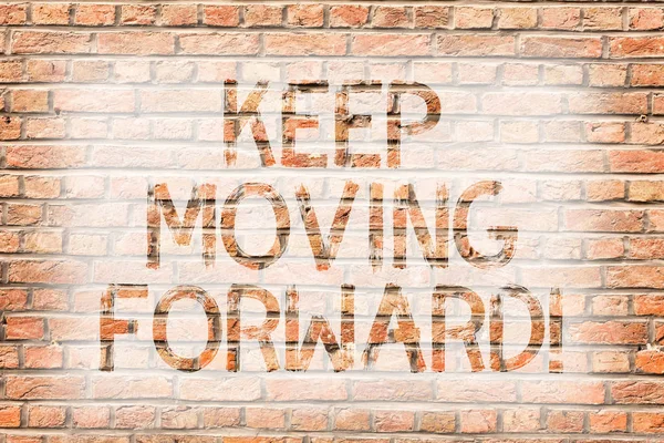 Text sign showing Keep Moving Forward. Conceptual photo improvement Career encouraging Go ahead be better Brick Wall art like Graffiti motivational call written on the wall.