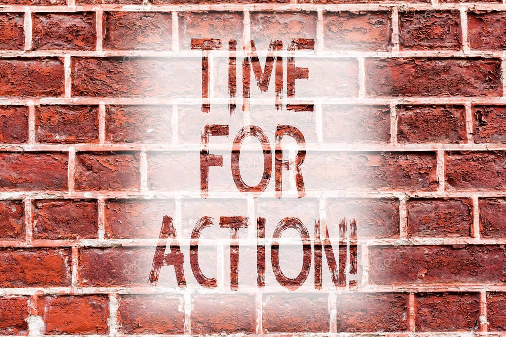 Handwriting text writing Time For Action. Concept meaning Urgency Move Encouragement Challenge Work Brick Wall art like Graffiti motivational call written on the wall.