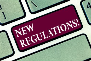 Kavramsal el yeni düzenlemeler gösterilen yazma. İş fotoğraf metin değişikliği, yasa kuralları kurumsal standartları özellikleri klavye tuşu bilgisayar ileti fikir oluşturmak için niyet.