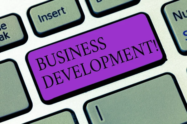 Conceptual hand writing showing Business Development. Business photo showcasing Develop and Implement Organization Growth Opportunities Keyboard key Intention to create computer message idea. — Stock Photo, Image