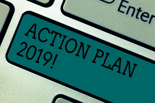 Text sign showing Action Plan 2019. Conceptual photo to do list in new year New year resolution goals Targets Keyboard key Intention to create computer message pressing keypad idea.
