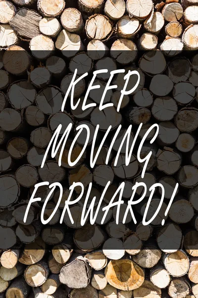 Writing note showing Keep Moving Forward. Business photo showcasing Optimism Progress Persevere Move Wooden background vintage wood wild message ideas intentions thoughts.