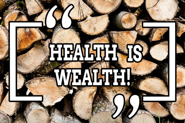 Handwriting text writing Health Is Wealth. Concept meaning being in good shape great value Stay healthy eat Healthy Wooden background vintage wood wild message ideas intentions thoughts.