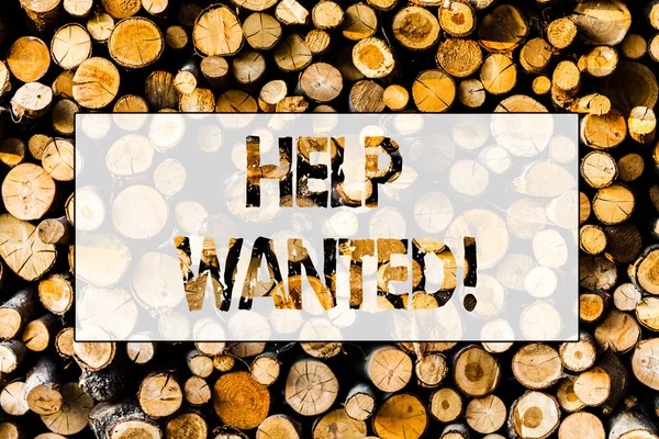 Handwriting text Help Wanted. Concept meaning Employee needed Worker Recruitment Headhunting Wooden background vintage wood wild message ideas intentions thoughts.