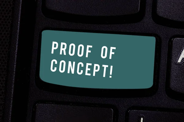 Writing note showing Proof Of Concept. Business photo showcasing evidence typically deriving from experiment or project Keyboard key Intention to create computer message pressing keypad idea.