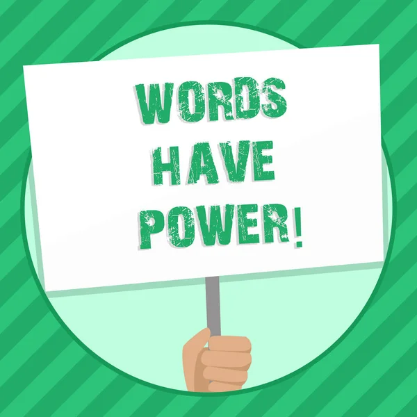 Handwriting text writing Words Have Power. Concept meaning Statements you say have the capacity to change your reality Hand Holding Blank White Placard Supported by Handle for Social Awareness.