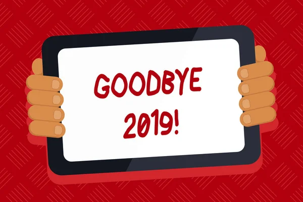 Conceptual hand writing showing Goodbye 2019. Business photo text express good wishes when parting or at the end of last year Color Tablet Smartphone with Screen Handheld Back of Gadget.