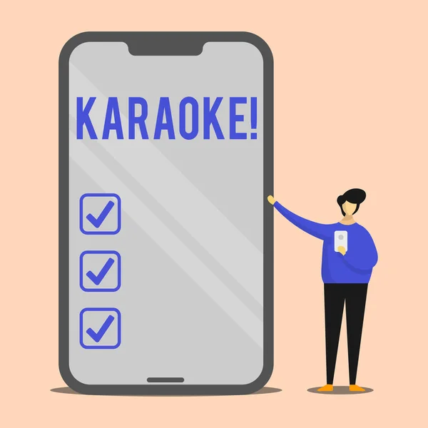 Handgeschreven tekst Karaoke. Begrip betekenis Entertainment zingen langs instrumentale muziek gespeeld door een machine Man presenteren enorme lege scherm Smartphone terwijl een ander mobiel Holding. — Stockfoto
