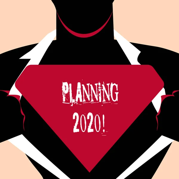 Handwriting text Planning 2020. Concept meaning process of making plans for something next year Man in Superman Pose Opening his Shirt to reveal the Blank Triangular Logo.