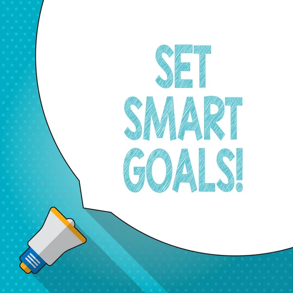Word writing text Set Smart Goals. Business concept for list to clarify your ideas focus efforts use time wisely Huge Blank White Speech Bubble Occupying Half of Screen and Small Megaphone.