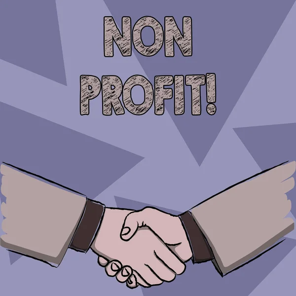 Text tecken visar Non Profit. Konceptuella foto inte gör eller bedrivs primärt för att göra vinstorganisation affärsmän skaka händerna ordentligt som gest Form av hälsning och avtal. — Stockfoto