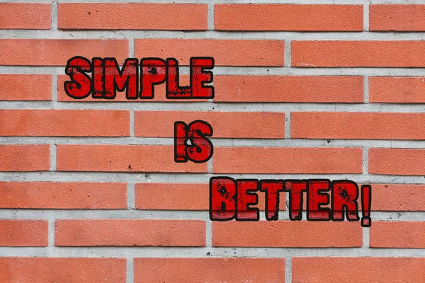 Word writing text Simple Is Better. Business concept for being in natural status do not put makeup keep pure Brick Wall art like Graffiti motivational call written on the wall.