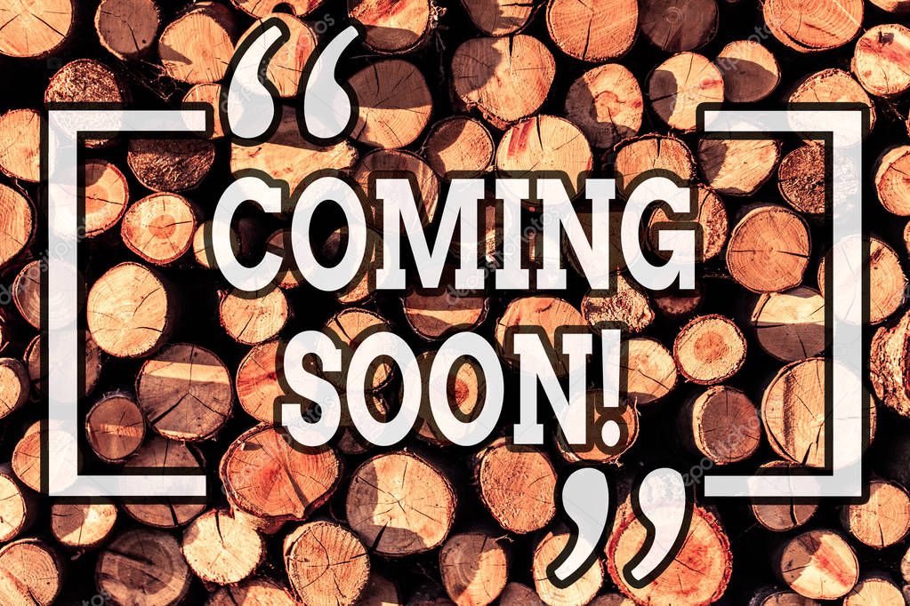 Handwriting text writing Coming Soon. Concept meaning event or action that will happen after really short time Wooden background vintage wood wild message ideas intentions thoughts.