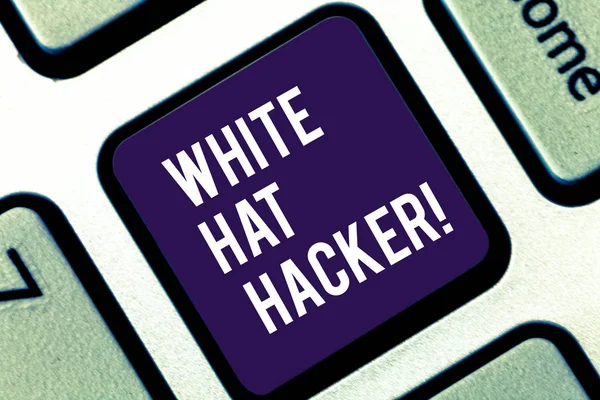 Handwriting text writing White Hat Hacker. Concept meaning Computer security expert specialist in penetration testing Keyboard key Intention to create computer message pressing keypad idea.