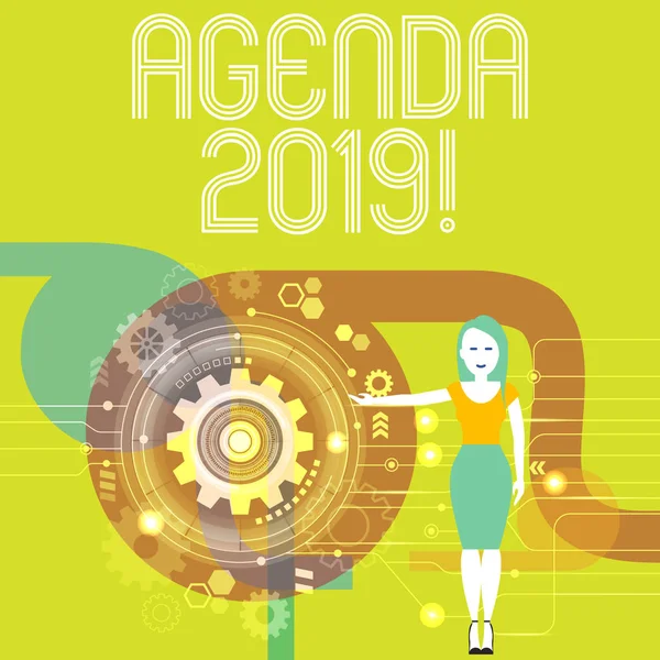 Käsiala tekstin kirjoittaminen Agenda 2019. Käsitteellä tarkoitetaan luetteloa asioista, joista keskustellaan virallisessa kokouksessa tai tapahtumassa nainen seisoo ja esittelee SEO-prosessin, jossa on hammaspyöräteline sisällä . — kuvapankkivalokuva
