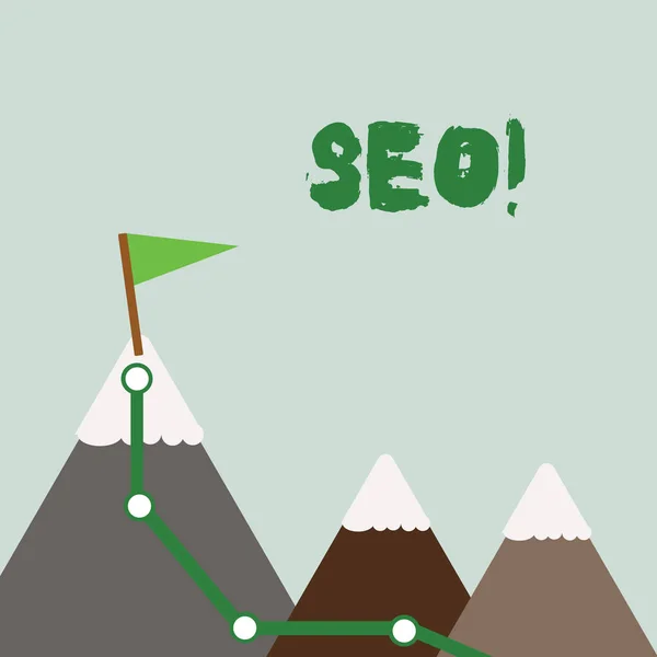 Tekst bord toont SEO. Conceptuele foto Search Engine Optimization toename in online marketingkanaal Driebergen met wandelpad en witte besneeuwde top met vlag op een piek. — Stockfoto