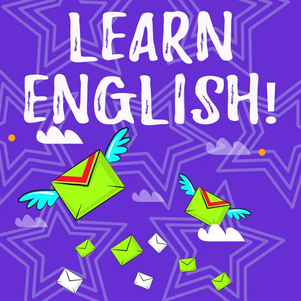 Text sign showing Learn English. Conceptual photo gain acquire knowledge in new language by study Many Colorful Airmail Flying Letter Envelopes and Two of Them with Wings.